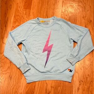Aviator Nation Light Blue Crewneck with Pink/Purple ombré Lightning bolt size XS